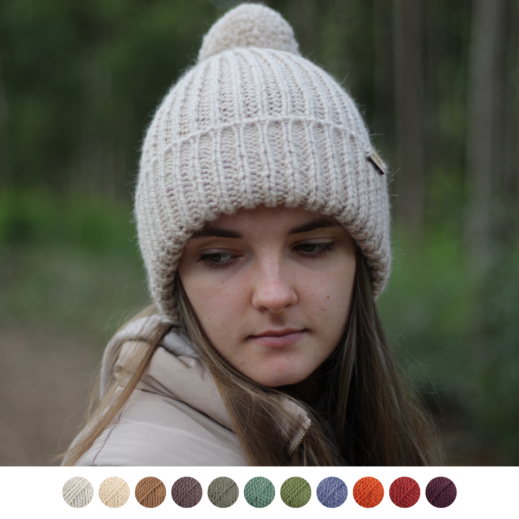 Woman wearing handmade knitted thick alpaca wool beanie unisex for woman and men. Available to order in different colors, winter holiday gift from Lana Royals Pet Wear.